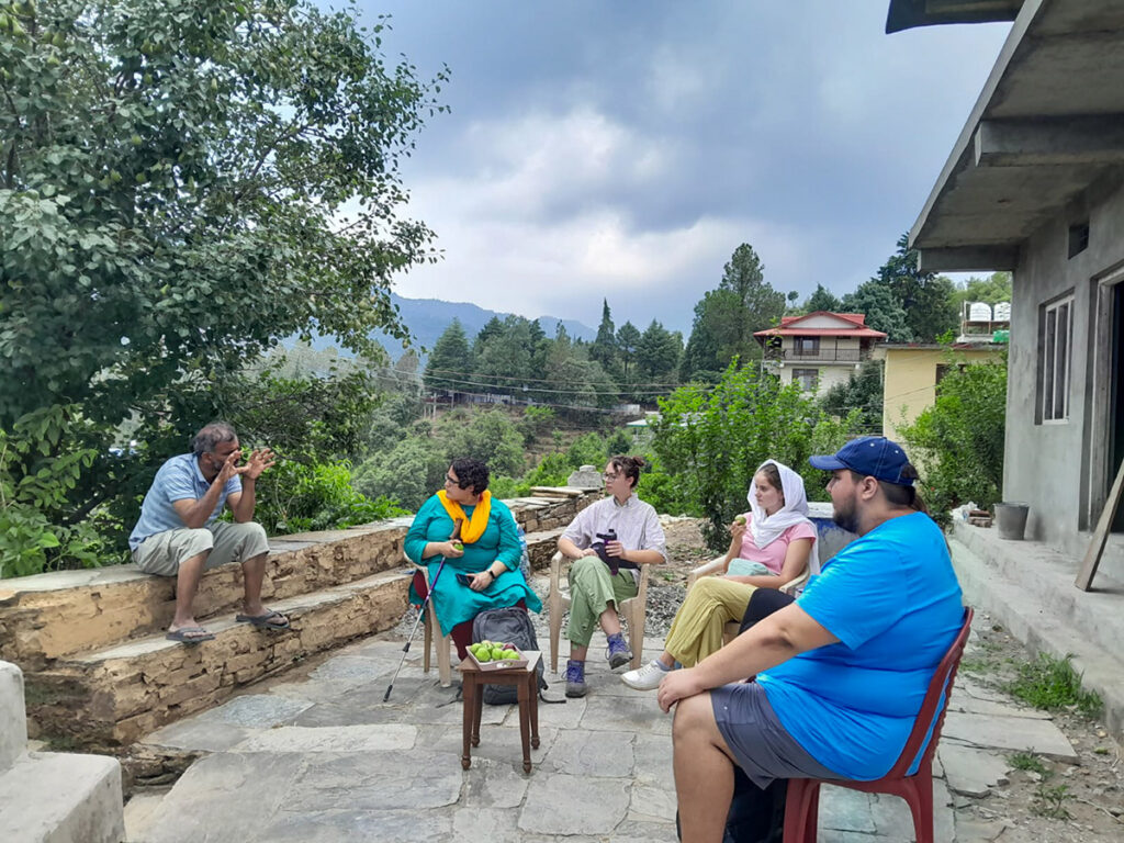 Students talk with locals